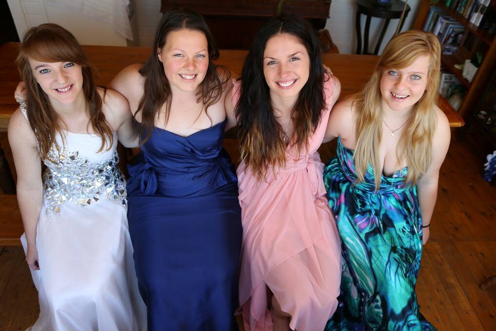 Queanbeyan High School year 12 students Stephanie Rayment, Amy Birtles, Jessie Mitchell and Katherine O'Brien in their formal frocks