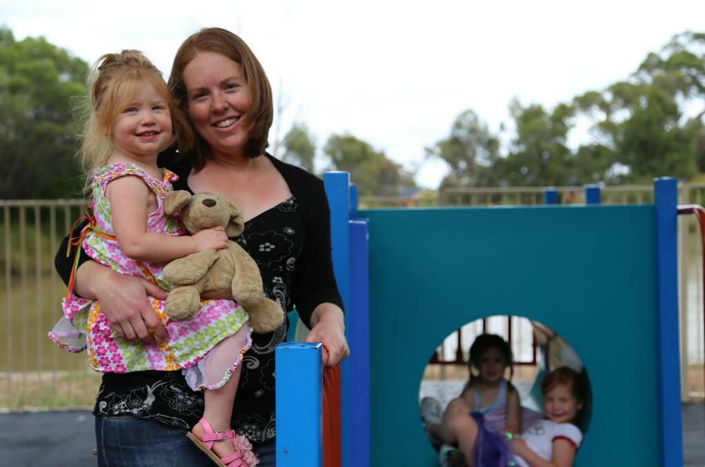 Jerrabomberra Playgroup convenor Elizabeth Lozberis with daughter Anneliese, 2 said the Jerrabomberra Community Centre's new extension will provide more options for community groups. Photo: Kim Pham.