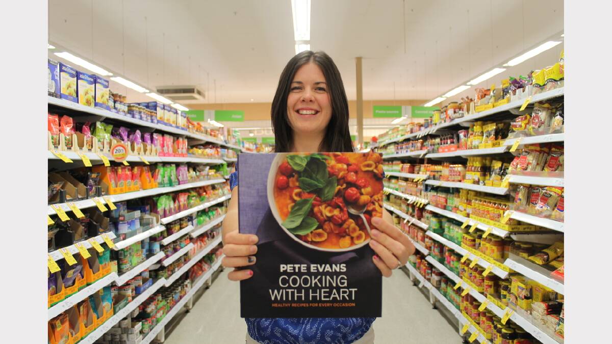 Local nutritionist Kate Freeman gives Cooking With Heart by Pete Evans the tick of approval. Photo: Kim Pham.