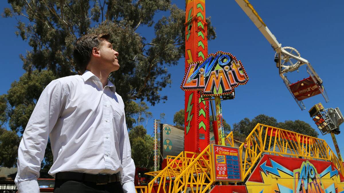 Queanbeyan Age reporter David Butler surveys the tower of terror that is the No Limit which debuts at the Queanbeyan Show this weekend.