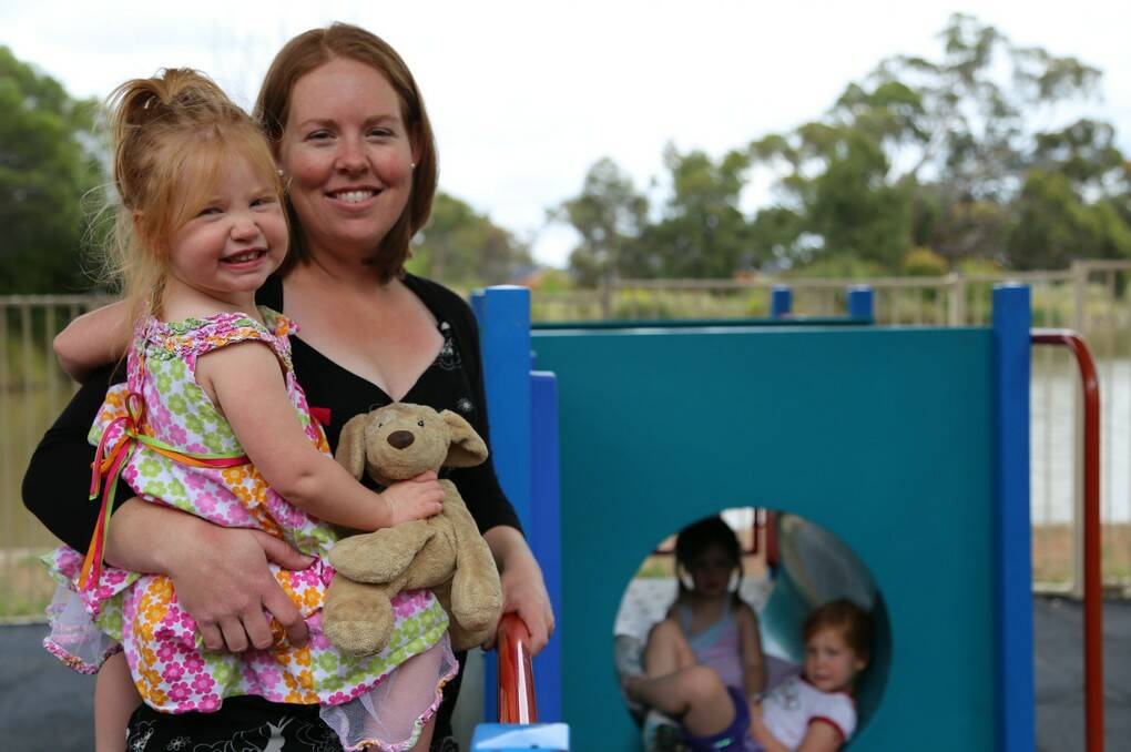 Jerrabomberra Playgroup convenor Elizabeth Lozberis with daughter Anneliese, 2 said the Jerrabomberra Community Centre's new extension will provide more options for community groups. Photo: Kim Pham.