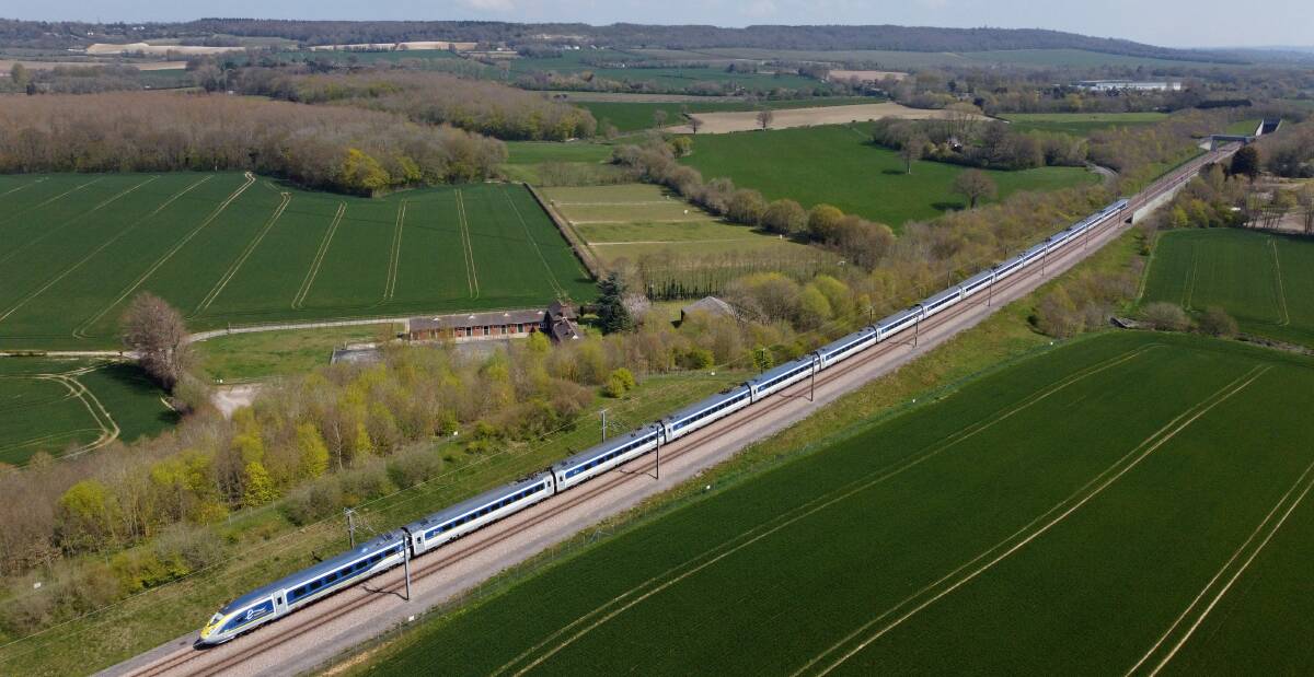 A Eurostar train passes through the Kent countryside. A Eurostar train passes through the Kent countryside.