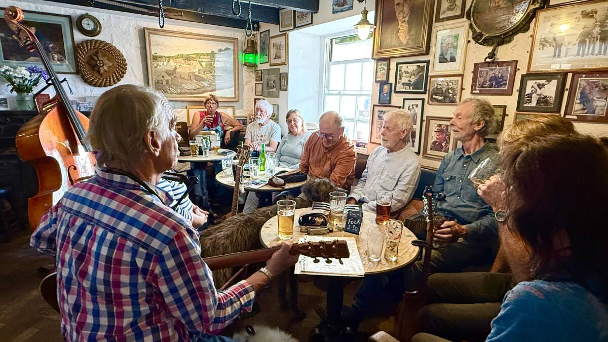 Local musos at the Cadgwith Cove Inn. Picture by Susan Gough Henly Local musos at the Cadgwith Cove Inn. Picture by Susan Gough Henly