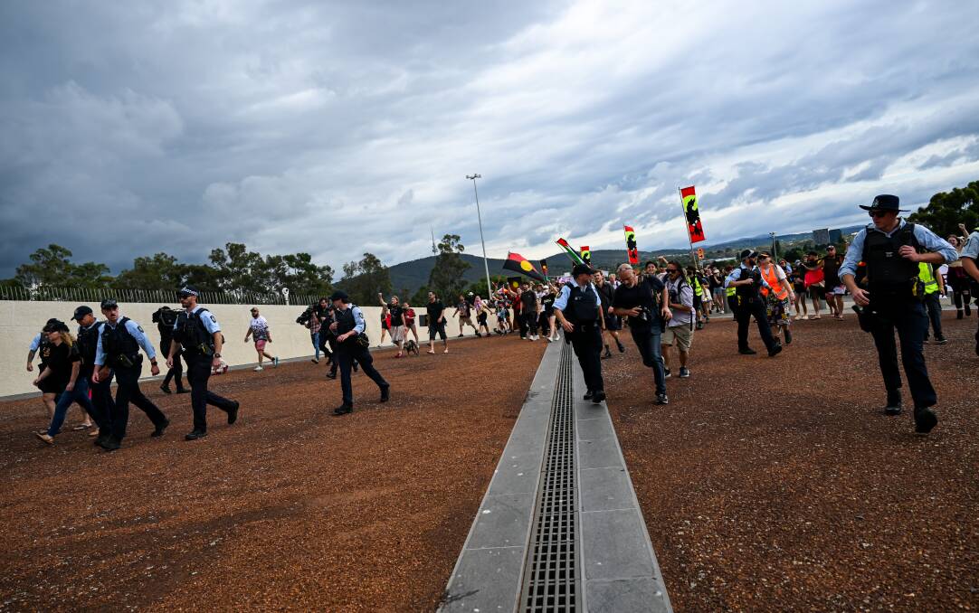ACT Policing officers decided to barricade the entrance to Parliament House. Picture by Elesa Kurtz
