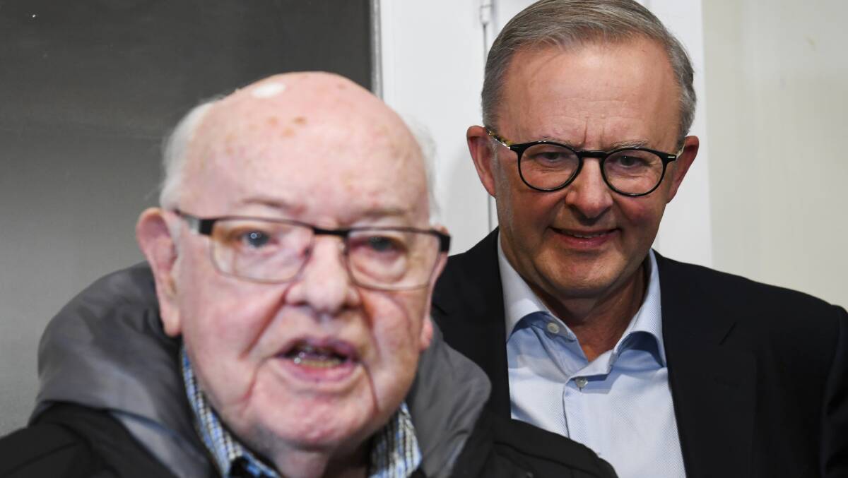 Prime Minister Anthony Albanese with Father Bob Maguire during the 2022 Federal Election campaign. Photo: Lukas Coch/AAP.