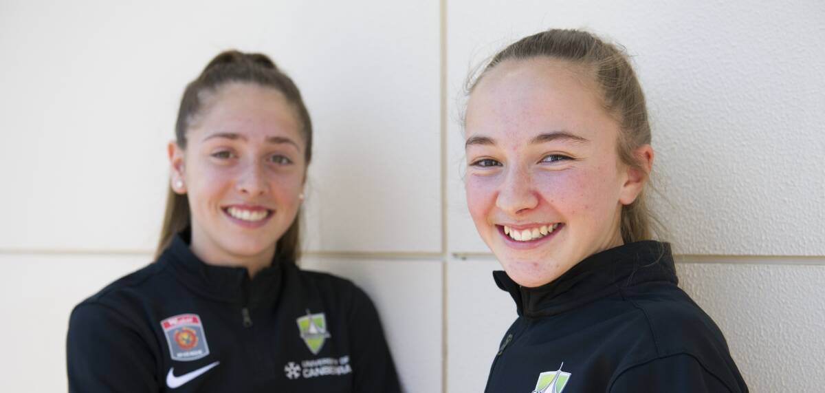 SCORING GOALS: Karly Roestbakken, pictured with Laura Hughes, has made a solid start to her career with the Canberra United. Photo: Jay Cronan