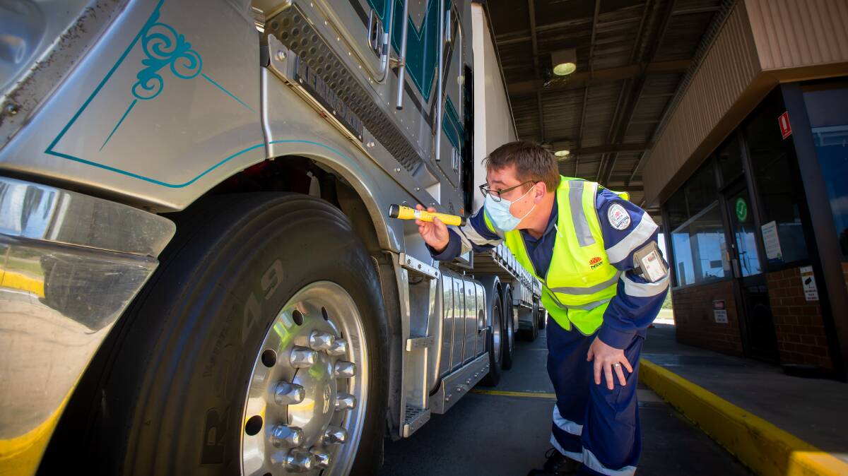 Compliance officer Tim Chesterton inspects a truck at the Marulan Heavy Vehicle Safety Station. Picture: Elesa Kurtz