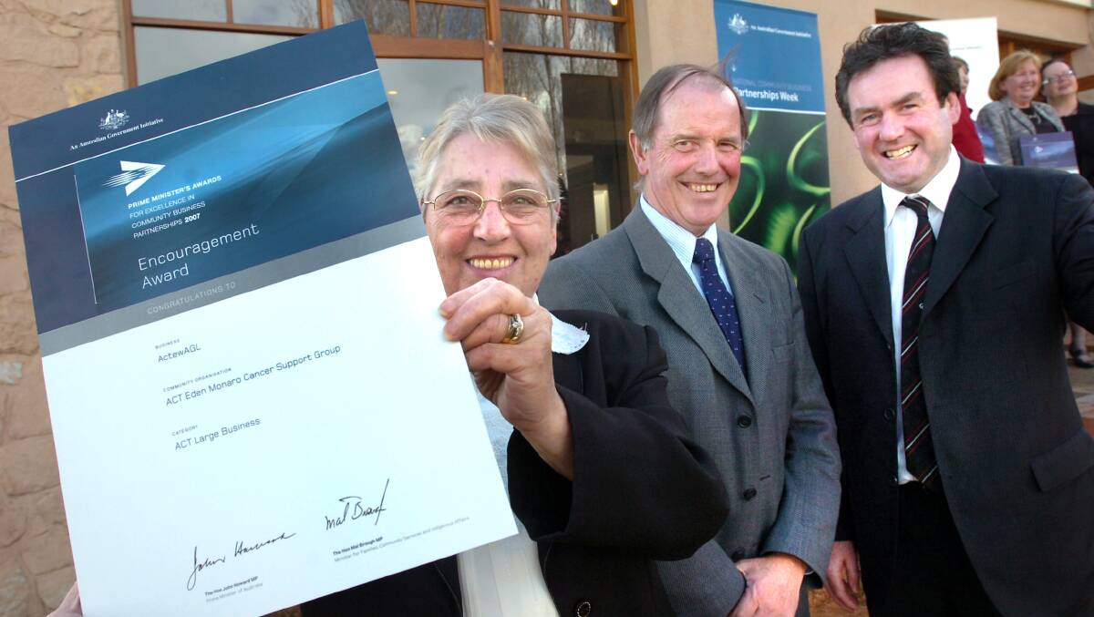 Yvonne Cuschieri, with chairman Hugh Percy and ActewAGL's Paul Walshe , holds the Encouragement Award awarded with ActewAGL Community Business Partnerships in Canberra at the 2007 PMs Awards for Excellence presentations. Photo: Richard Briggs