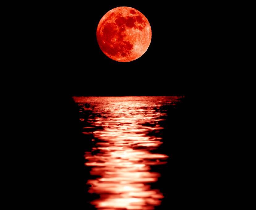 Full red moon with reflection closeup showing the details of the lunar surface. As seen from Varna,Bulgaria. Photo: Stanimir G.Stoev