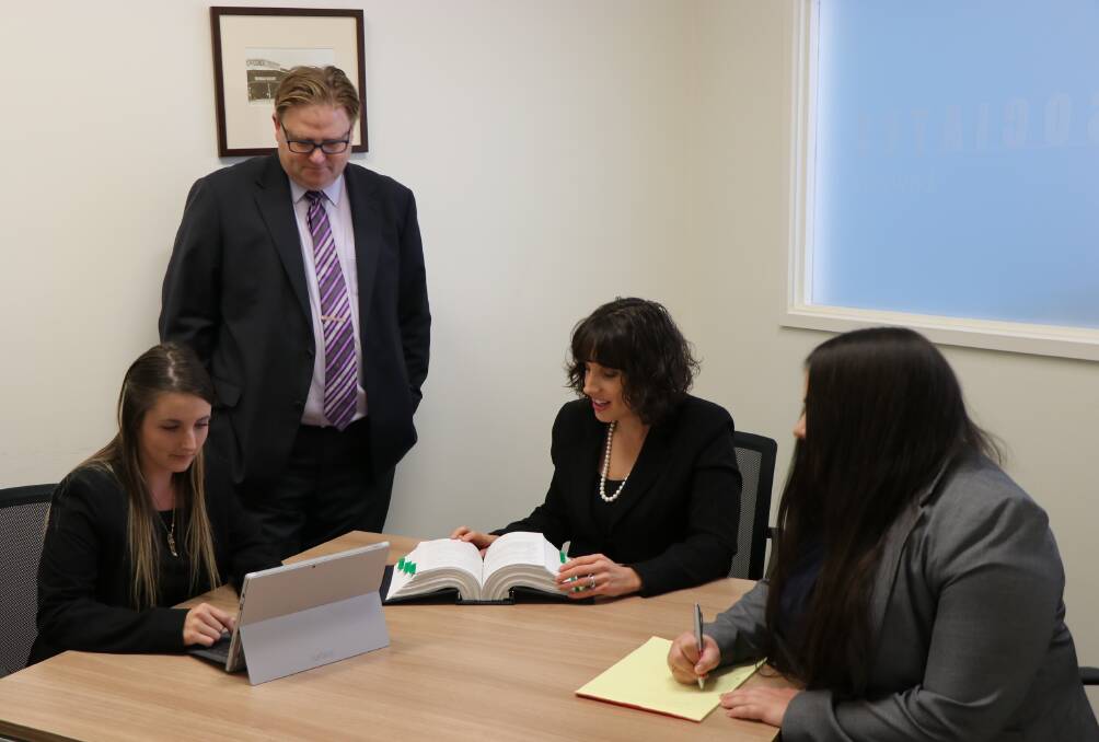A busy team of locals: Starting in Queanbeyan 10 years ago with only Mr Herring and a receptionist, the firm now has four solicitors, four support staff, and they are looking for a fifth solicitor.