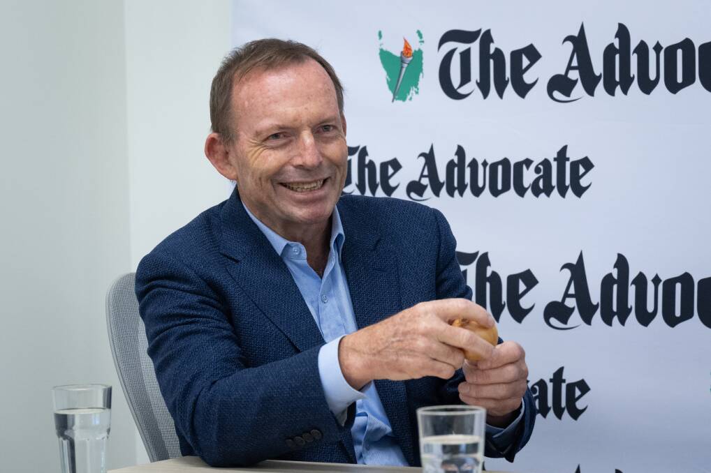 A man of many layers. Tony Abbott with an onion. Picture by David Bellamy