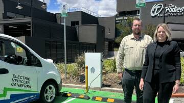 The Tradies facilities manager Steven Blakemore with CEO Alison Percival at the new EV charging station. Picture The Tradies