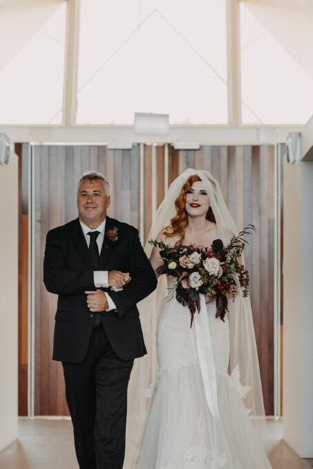 Proud father of bride Peter McGuigan with daughter Madeline McGuigan as they walked into the Margaret Whitlam Pavillion, National Arboretum of Australia.