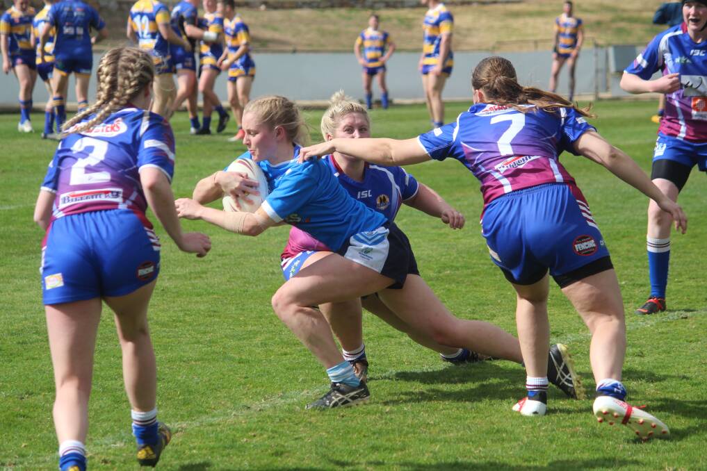 Multi-skilled: Remi Wilton attempts to break free from a Goulburn Stockmen tackle in the 2018 Katrina Fanning Shield preliminary final, in which she led the Queanbeyan Blues. Photo: Zac Lowe.
