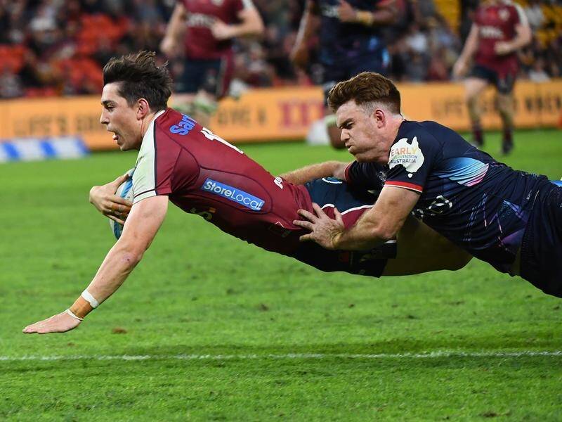 Jock Campbell was among the scorers as the Reds beat the Rebels by four points in Brisbane. (Jono Searle/AAP PHOTOS)