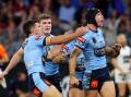 Matt Burton (R) has been a dynamic State of Origin inclusion for NSW as the Blues beat Queensland.