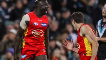 Mabior Chol had two goals overturned on review in Gold Coast's narrow AFL loss to Port Adelaide.