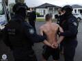 Police raids across southwestern Sydney on Tuesday followed a 10-month covert operation.