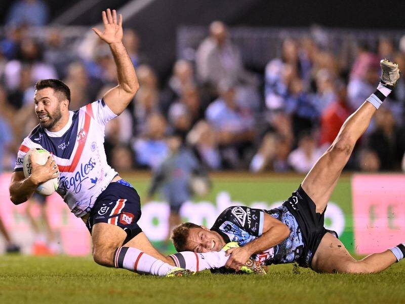 The Sydney Roosters have fended off a second-half fightback from Cronulla in a 36-16 NRL win.
