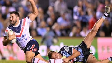 The Sydney Roosters have fended off a second-half fightback from Cronulla in a 36-16 NRL win.