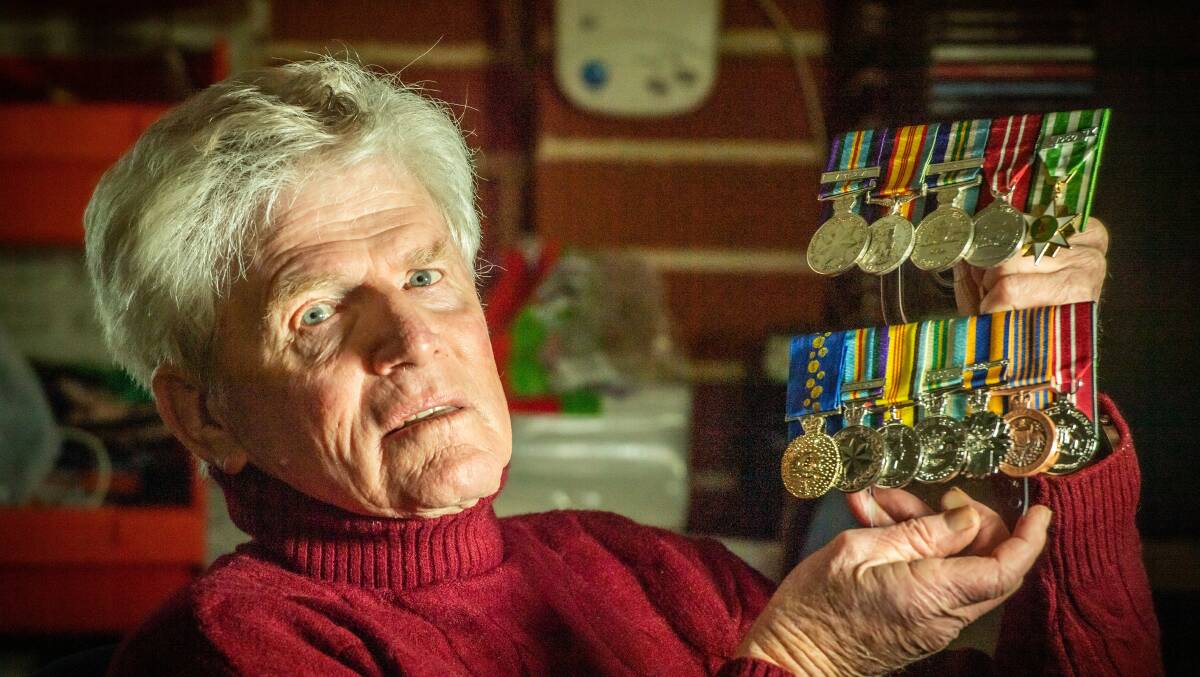 Vietnam veteran Richard Stone with his and his brothers medals from their service in the war. Picture by Karleen Minney.