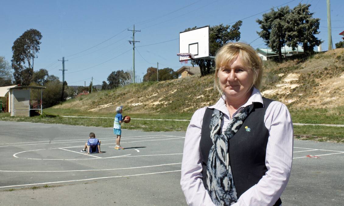 Council parks' officer Debbie Sibbick at Crestwood's Henderson Park. Queanbeyan Council will spend $250,000 in the coming months to transform the area into a suburban community hub.