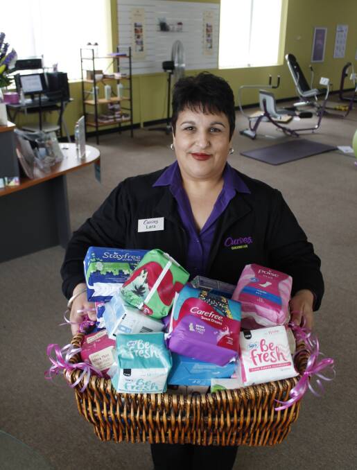 Curves Queanbeyan owner Lara Zelenka is proud to be the only local drop-off point for the "Share the Dignity" initiative. Photo: Kim Pham.