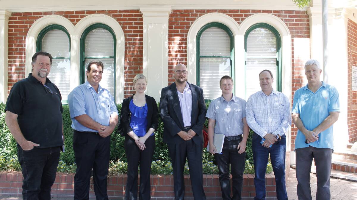 Dendy representatives Kathryn Craig and Nick Hayes (centre) with committee members (from left) Richard Harris, Cr Jamie Cregan, Alex Adkins, Cr Brian Brown and Steve Bartlett.