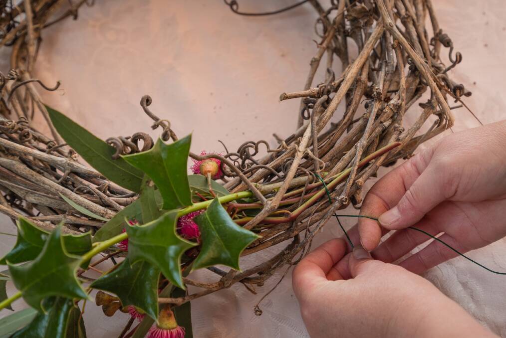 Step three: Secure the stems with the pliable wire and continue this step with smaller  foliage.