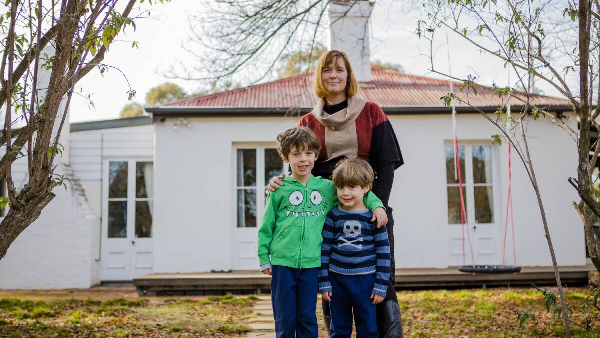 Kate Gauthier is concerned about heritage being destroyed at Oaks Estate. Kate Gauthier with her two sons Atticus 5, and Luther 4. Photo: Jamila Toderas.