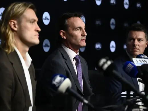 AFL CEO Andrew Dillon (c) says the AFL's new drugs policy is the most stringent in Australian sport. Photo: Joel Carrett/AAP PHOTOS